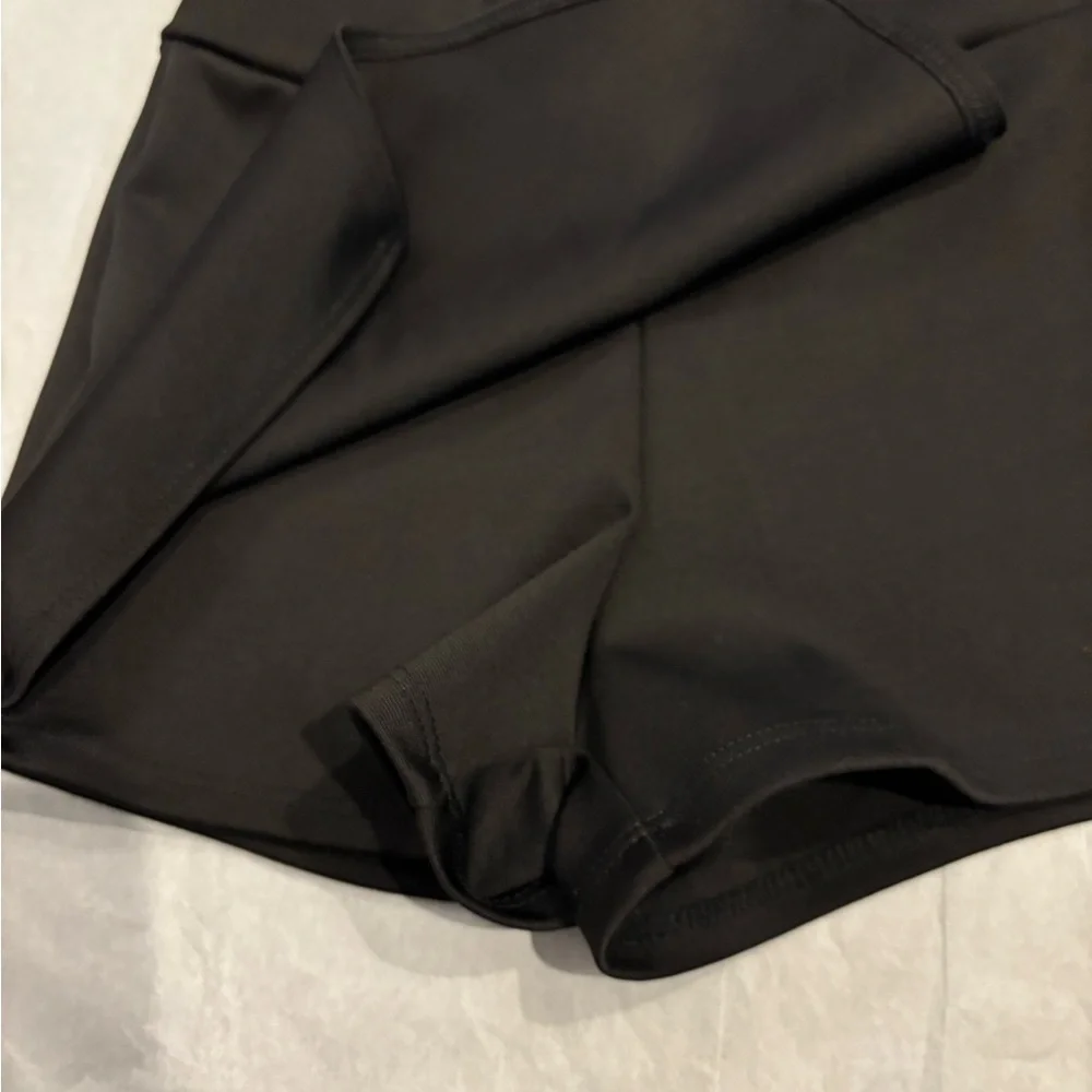 Cheryl Creations Black Asymmetrical Mini Envelope skort - size small (7-8)